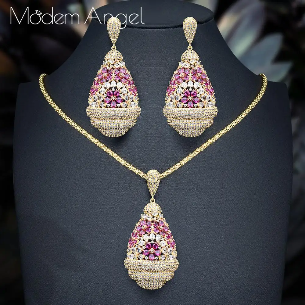 Комплект украшений ModemAngel, из ожерелья и серёг, с кубическим цирконием, капля воды цветок
Комплект украшений ModemAngel, из ожерелья и серёг, с кубическим цирконием, капля воды цветок