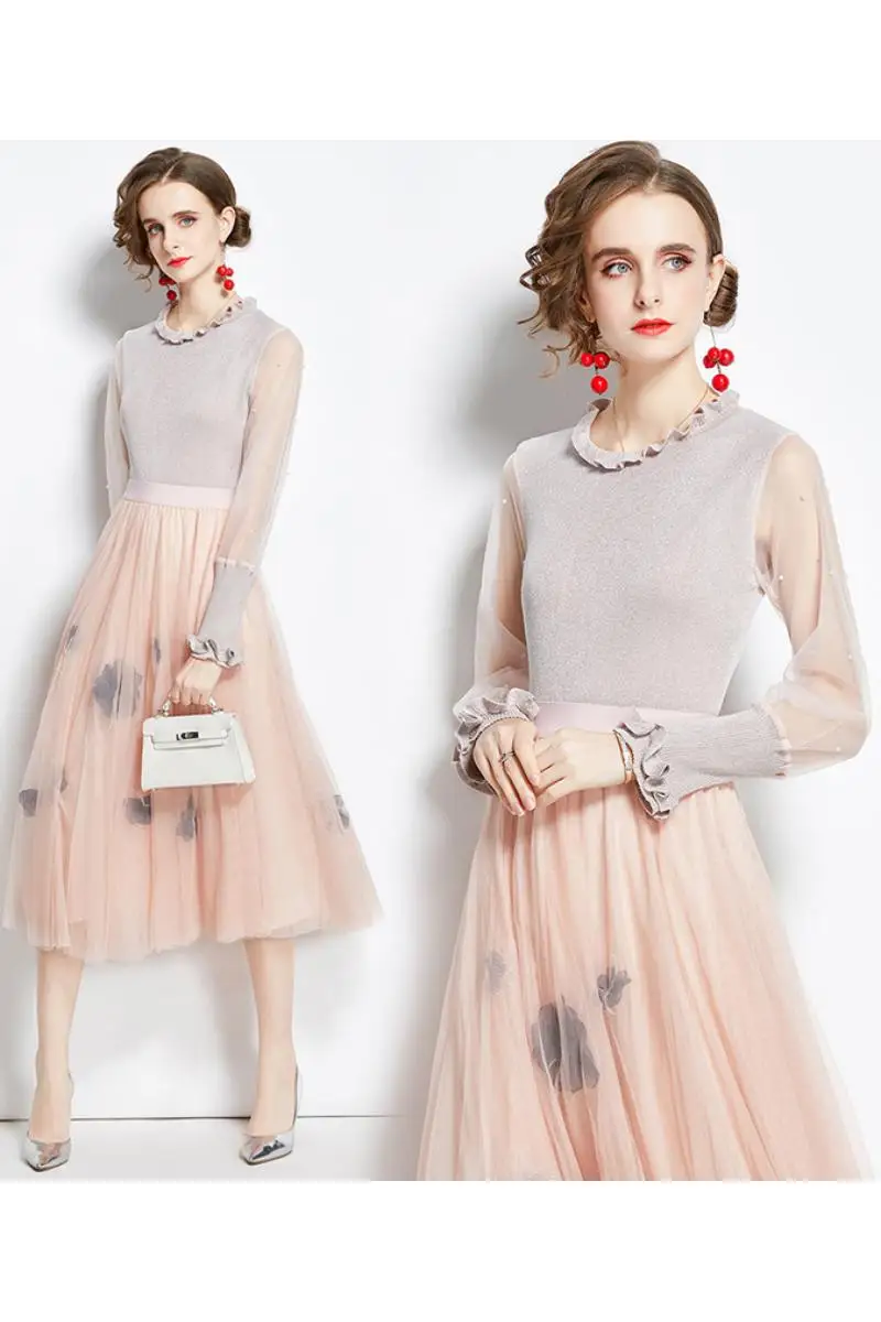 Autumn and winter knitted mesh stitching long-sleeved top sweater 3D applique long skirt two-piece suit women
Autumn and winter knitted mesh stitching long-sleeved top sweater 3D applique long skirt two-piece suit women