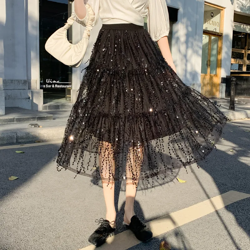 CHIC Ins Spring 2021 Women Fashion Bling Grain Sequins Tassels Mesh Midi Skirts Elegant Sweet European Bohemian Lady Long Bottom
CHIC Ins Spring 2021 Women Fashion Bling Grain Sequins Tassels Mesh Midi Skirts Elegant Sweet European Bohemian Lady Long Bottom