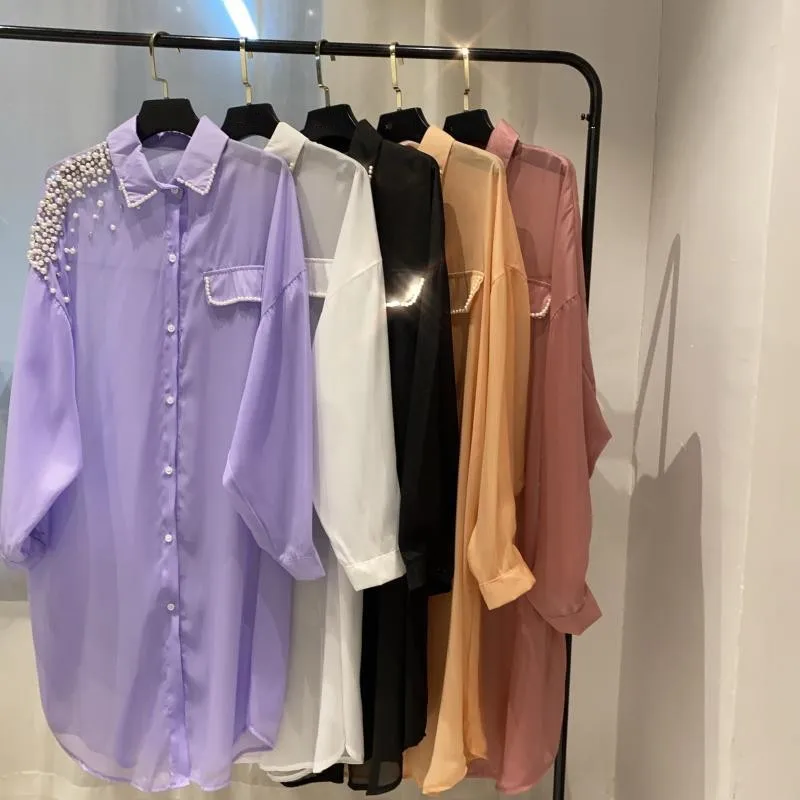 Designer Summer Pearls Split Loose Fit Long Shirts Women Thin Section Perspective Long Sleeve Blouse New Female Streetwear Tops
Designer Summer Pearls Split Loose Fit Long Shirts Women Thin Section Perspective Long Sleeve Blouse New Female Streetwear Tops