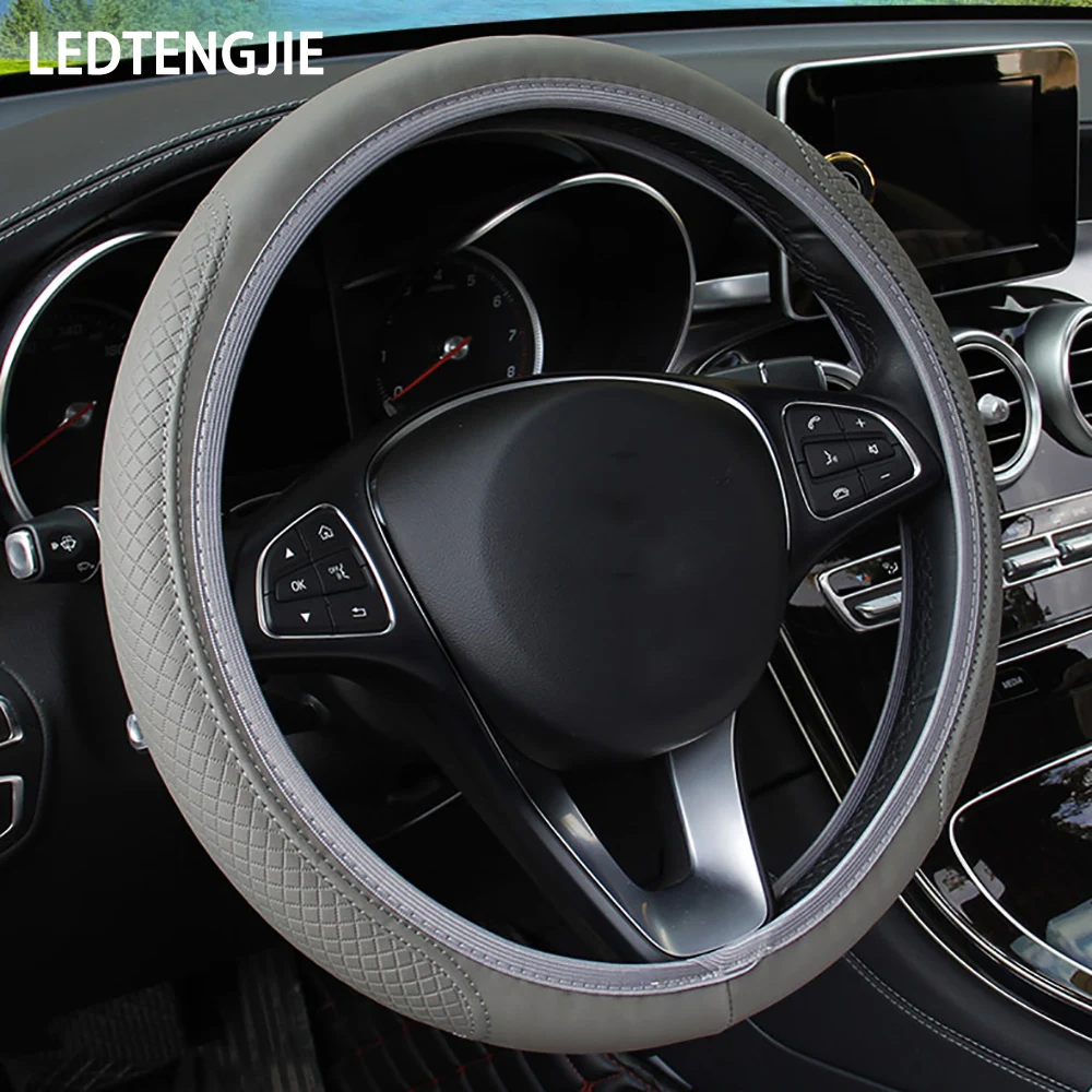 LEDTENGJIE The Car Steering Wheel Cover Has No Inner Ring Fiber Grain Artificial Leather, Fashionable and Diverse
LEDTENGJIE The Car Steering Wheel Cover Has No Inner Ring Fiber Grain Artificial Leather, Fashionable and Diverse