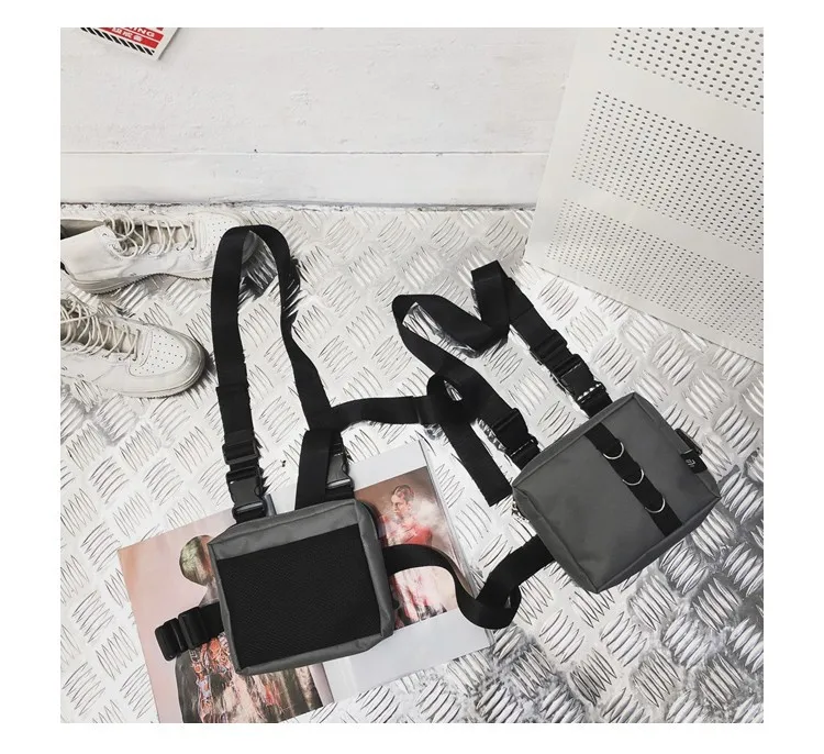 Punk Chest Bag Hip-Hop Tactical Streetwear Waist Pack Unisex Outdoor Functional Vest bags Two Pockets Harness Chest Rig Bag
Punk Chest Bag Hip-Hop Tactical Streetwear Waist Pack Unisex Outdoor Functional Vest bags Two Pockets Harness Chest Rig Bag