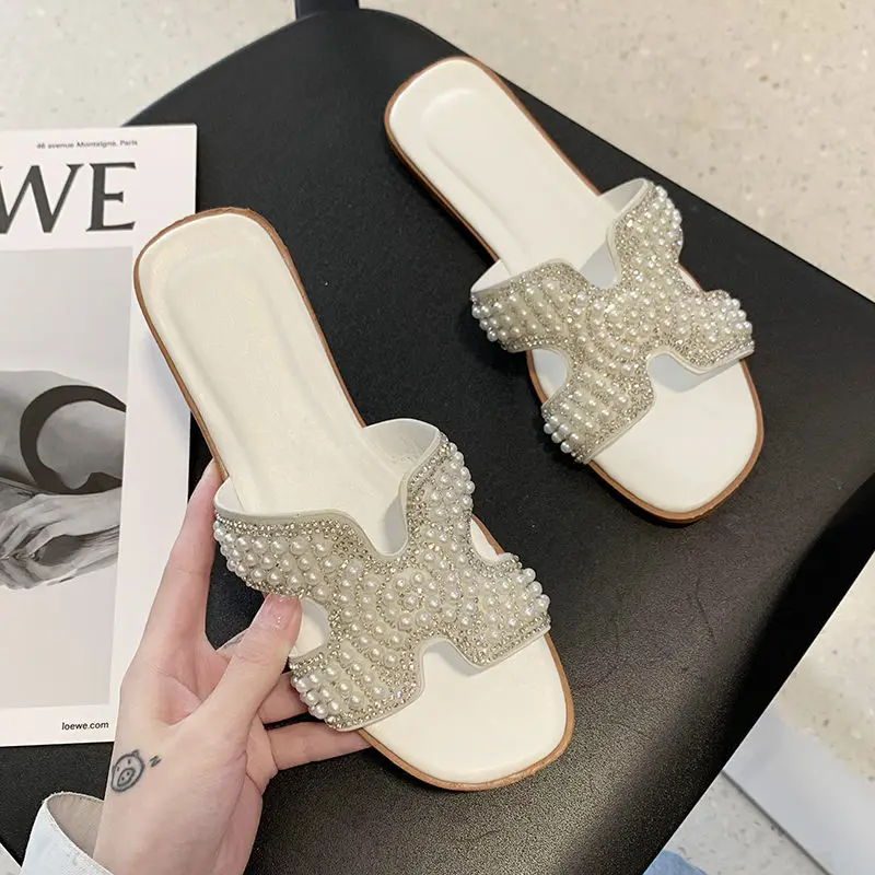 2021 new flat bottom women's shoes summer candy color bow bright flashing flip flops female beach students Korean casual slipper
2021 new flat bottom women's shoes summer candy color bow bright flashing flip flops female beach students Korean casual slipper
