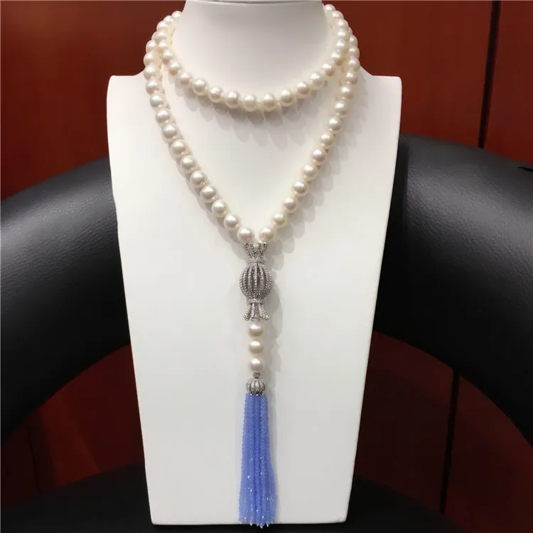 Hand knotted 75+15cm 8-9mm white freshwater pearl micro inlay zircon clasp blue glass tassel necklace fashion jewelry
Hand knotted 75+15cm 8-9mm white freshwater pearl micro inlay zircon clasp blue glass tassel necklace fashion jewelry