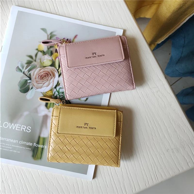 Multifunctional Thin Short Wallet Female Simple Large-capacity Two-folding Wallet One Coin Purse
Multifunctional Thin Short Wallet Female Simple Large-capacity Two-folding Wallet One Coin Purse