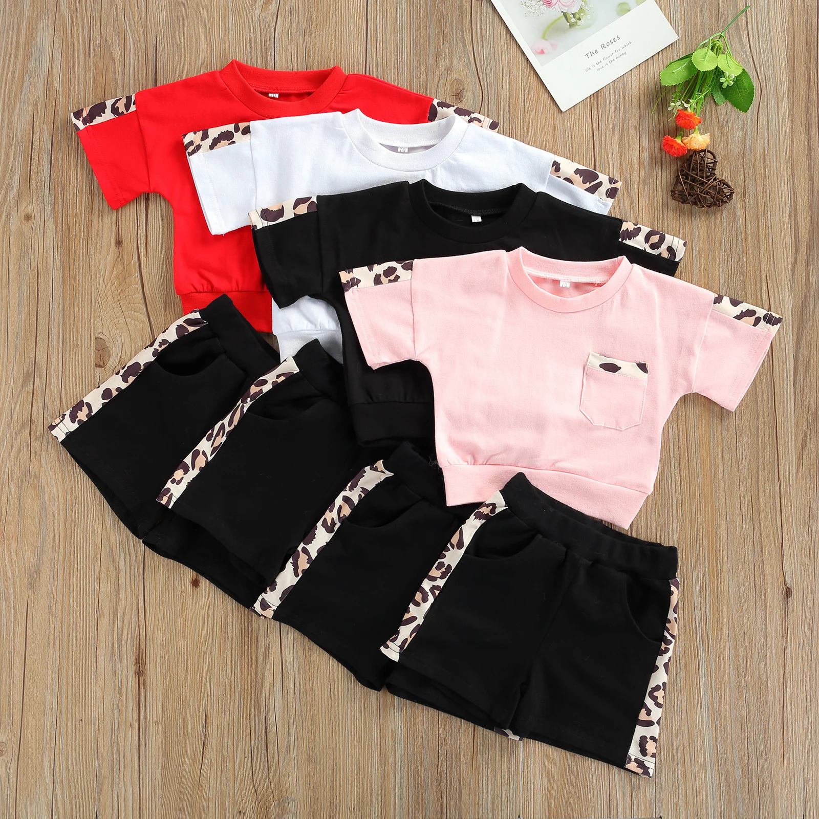 Children's casual T-shirt and shorts suit Fashion leopard stitching short-sleeved top and shorts
Children's casual T-shirt and shorts suit Fashion leopard stitching short-sleeved top and shorts