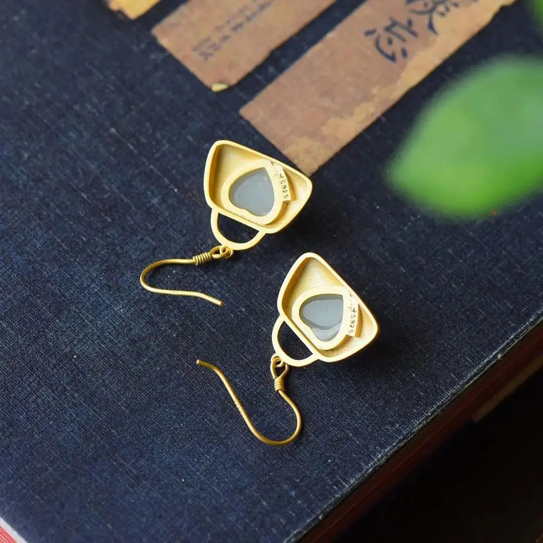 Natural Hetian Jade Heart-Shaped S925 Sterling Silver Earrings Female Niche Original Design Ornament
Natural Hetian Jade Heart-Shaped S925 Sterling Silver Earrings Female Niche Original Design Ornament
