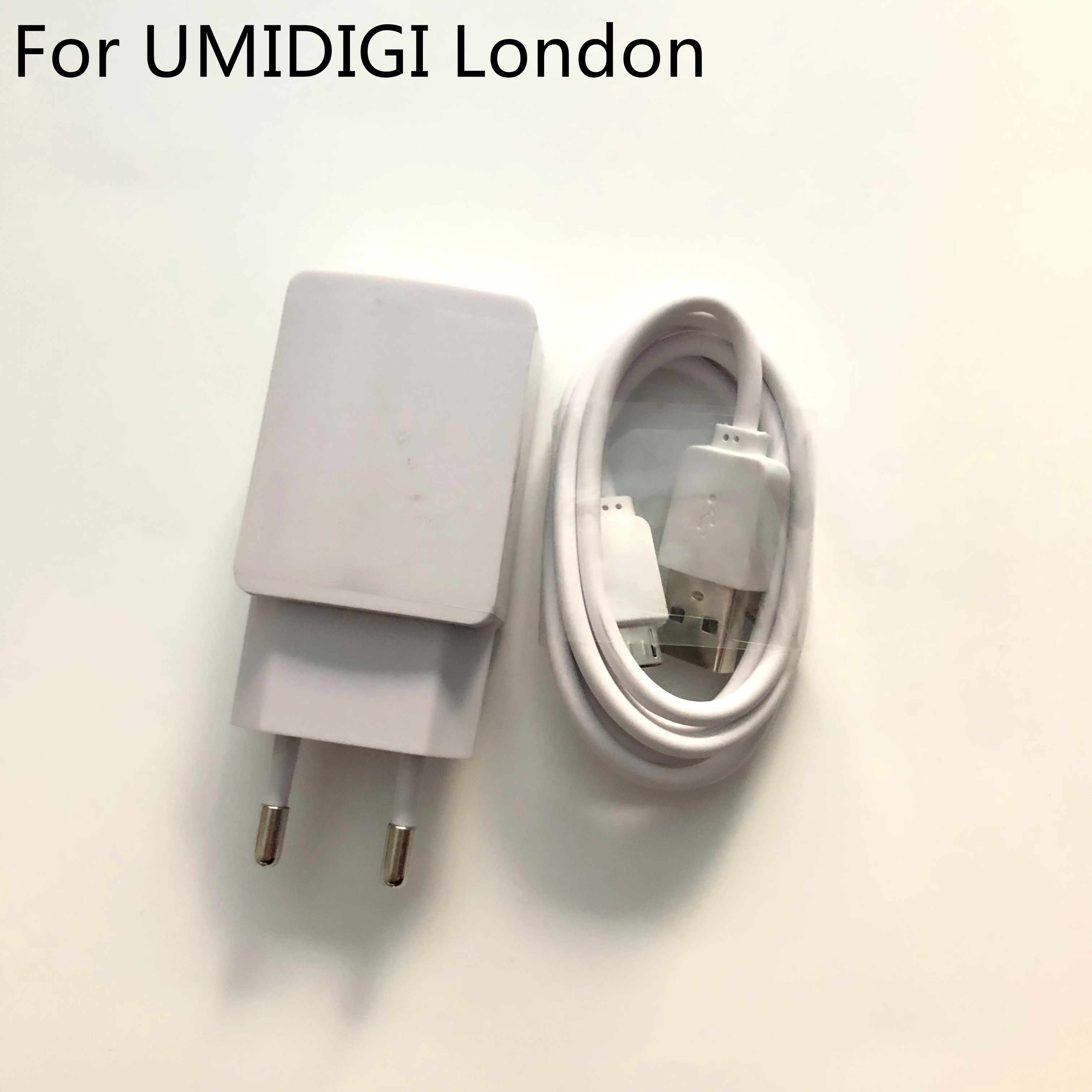 Зарядное устройство UMIDIGI London USB-кабель четырехъядерный MTK MT6580 5 дюймов 1280x720 |