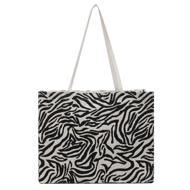 2021 new Korean version of the zebra bag women's network red tote bag niche design college students class large capacity package
2021 new Korean version of the zebra bag women's network red tote bag niche design college students class large capacity package