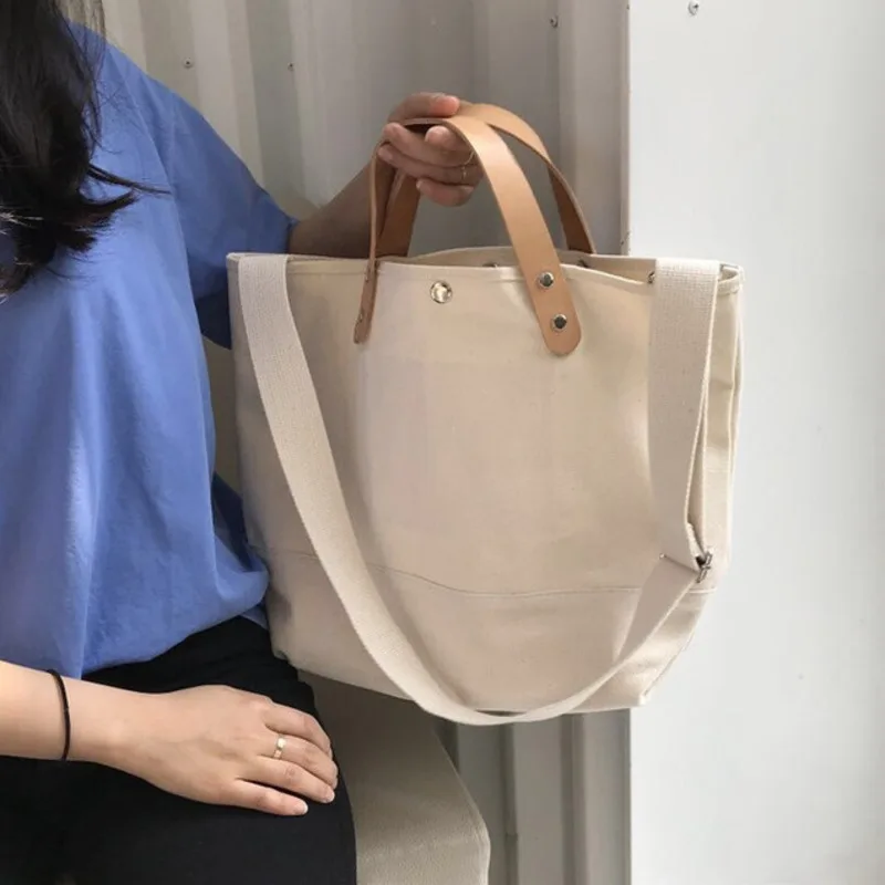 New Simple And Versatile E Bag Canvas Large-capacity Handbag Casual One-shoulder Messenger Female Bag Shopping Bag
New Simple And Versatile E Bag Canvas Large-capacity Handbag Casual One-shoulder Messenger Female Bag Shopping Bag