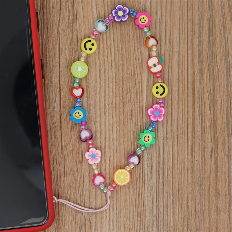 New Fashion Smile Mobile Phone Strap Flower Fruit Soft Pottery Rope for Cell Phone Chain Hanging Cord Women Jewelry Accessories
New Fashion Smile Mobile Phone Strap Flower Fruit Soft Pottery Rope for Cell Phone Chain Hanging Cord Women Jewelry Accessories