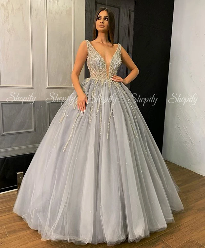 Puffy Sweet 16 Off Shoulder Ball Gowns Sixteen Beaded Pearls Silver Tulle Quinceanera Dress 2020
Puffy Sweet 16 Off Shoulder Ball Gowns Sixteen Beaded Pearls Silver Tulle Quinceanera Dress 2020