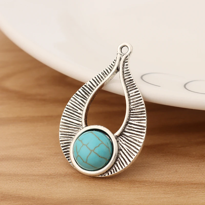 10 Pieces Tibetan Silver Water Drop Faux Turquoise Stone Charms Pendants Beads for Jewellery Making Accessories 35x23mm
10 Pieces Tibetan Silver Water Drop Faux Turquoise Stone Charms Pendants Beads for Jewellery Making Accessories 35x23mm