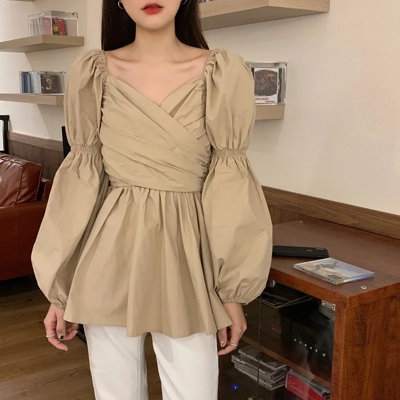 2021 Women Chic 2021 New Shirts Spring Solid V-Neck Cross Gentle Puff Sleeves Pleated Elegance Loose Blouse Female Tops
2021 Women Chic 2021 New Shirts Spring Solid V-Neck Cross Gentle Puff Sleeves Pleated Elegance Loose Blouse Female Tops
