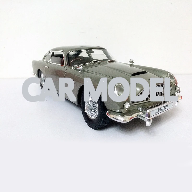 Игрушечные машинки из сплава Aston Martin DB5, 1:18 масштаб, горячие колеса 007, модель автомобиля, Детские игрушечные машинки, авторизованные оригина...
Игрушечные машинки из сплава Aston Martin DB5, 1:18 масштаб, горячие колеса 007, модель автомобиля, Детские игрушечные машинки, авторизованные оригина...