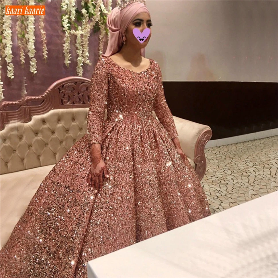 Sparkly Pink Long Sleeves Wedding Dress Dubai Sequined Arabian Ball Gown Bride Dresses Lace Up Custom Made 2020 Robe De Mariee
Sparkly Pink Long Sleeves Wedding Dress Dubai Sequined Arabian Ball Gown Bride Dresses Lace Up Custom Made 2020 Robe De Mariee