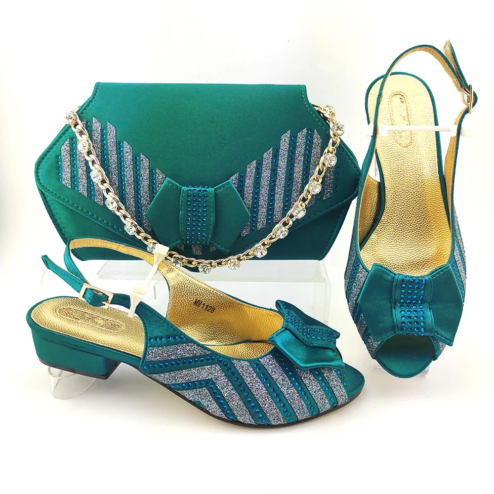 Wonderful Teal Women Shoes Match Handbag With Rhinestones Decoration African Dressing Pumps And Purse Set MM1128,Heel 4CM
Wonderful Teal Women Shoes Match Handbag With Rhinestones Decoration African Dressing Pumps And Purse Set MM1128,Heel 4CM