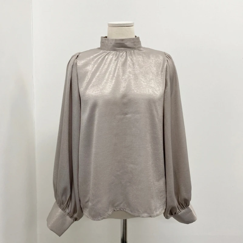 2021 Spring Korean Ins Chic Temperament Stand Collar Retro Lantern Sleeve Shirts Simple Loose Fashion All Match Women Tops
2021 Spring Korean Ins Chic Temperament Stand Collar Retro Lantern Sleeve Shirts Simple Loose Fashion All Match Women Tops