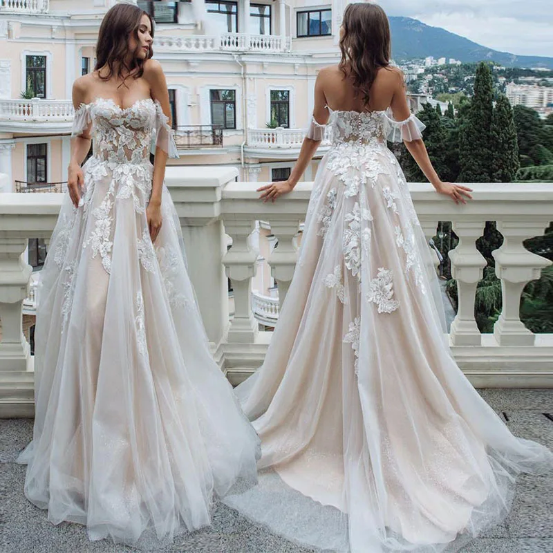 Wedding Dress 2021 Champagne Boho A Line Lace Appliques Tulle Backless Beach Bridal Gowns Off Shoulder Princess Vestido De Noiva
Wedding Dress 2021 Champagne Boho A Line Lace Appliques Tulle Backless Beach Bridal Gowns Off Shoulder Princess Vestido De Noiva