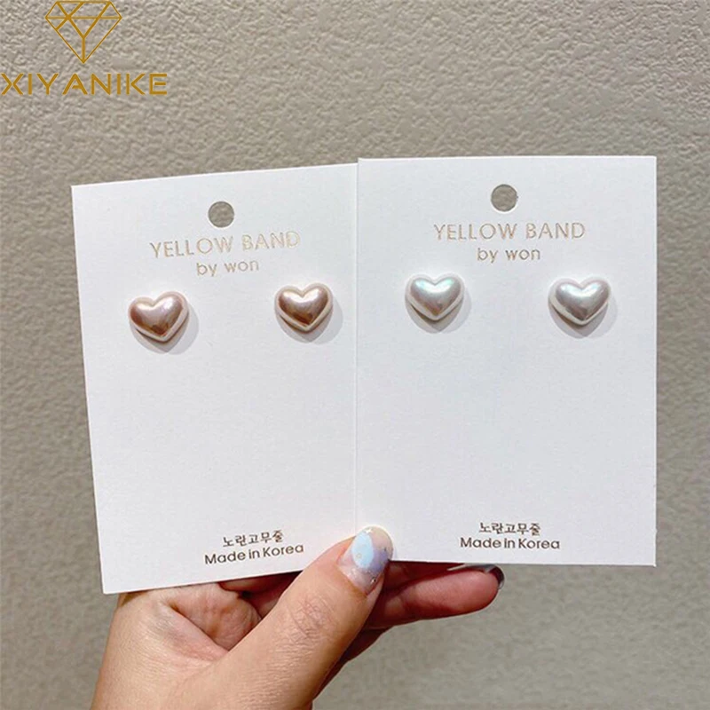 XIYANIKE Minimalist Trendy Heart Earrings For Women Elegant Chic Statement Pearl Stud Earrings 2020 Fashion Jewelry Accessories
XIYANIKE Minimalist Trendy Heart Earrings For Women Elegant Chic Statement Pearl Stud Earrings 2020 Fashion Jewelry Accessories