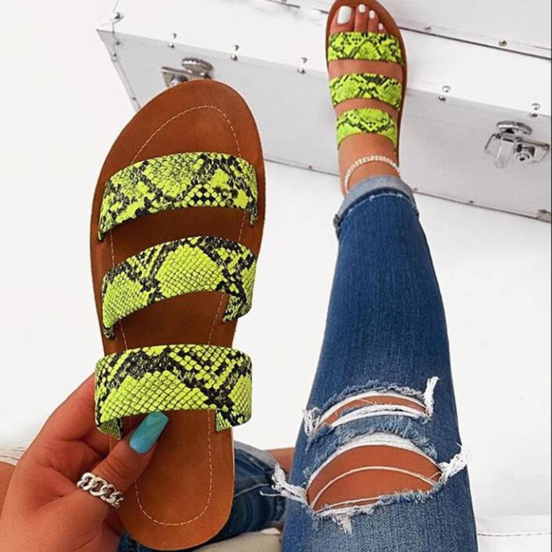 Hot Sale Women Shoes Slides Summer Fashion African Snake Skin Sandals Flat PVC Soled Sexy Female Slippers
Hot Sale Women Shoes Slides Summer Fashion African Snake Skin Sandals Flat PVC Soled Sexy Female Slippers