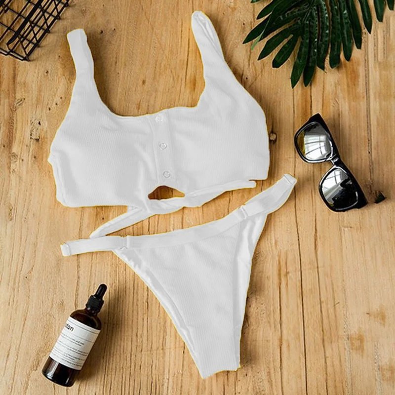 Women Sexy Chest Buttoned Bikinis Solid Color Swimwear Low Waist Thong Swimsuit Knotted Seaside Beachwear 
Women Sexy Chest Buttoned Bikinis Solid Color Swimwear Low Waist Thong Swimsuit Knotted Seaside Beachwear