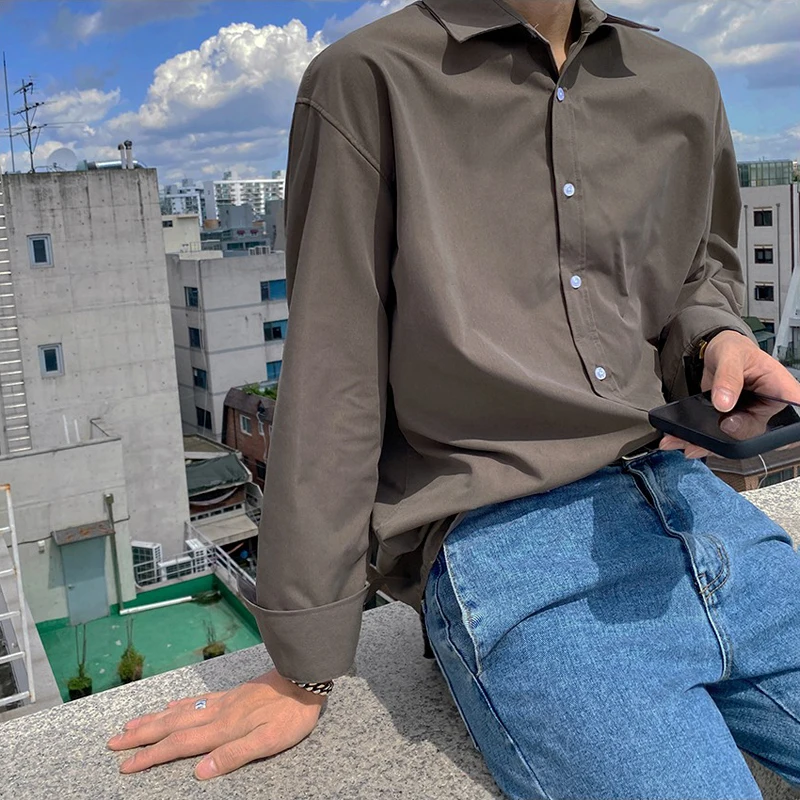 Fall shirt men's long-sleeved Korean version of the trend in a non-iron loose loose casual handsome boys white shirt
Fall shirt men's long-sleeved Korean version of the trend in a non-iron loose loose casual handsome boys white shirt