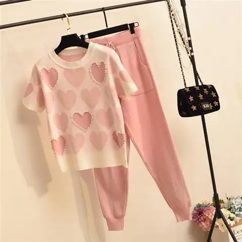 Women 2021 Summer Fashion Two-piece Casual Knitted Short-sleeve Pants Set Female Printed Beaded Pullover + Harem Pants Suit V246
Women 2021 Summer Fashion Two-piece Casual Knitted Short-sleeve Pants Set Female Printed Beaded Pullover + Harem Pants Suit V246