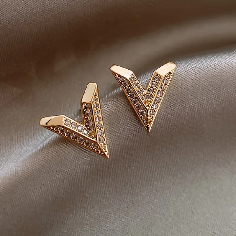 Pendientes de tuerca triangulares geometricos para mujer, Color dorado y plateado, antialergias, brillantes, Micro pave de circo
Pendientes de tuerca triangulares geometricos para mujer, Color dorado y plateado, antialergias, brillantes, Micro pave de circo