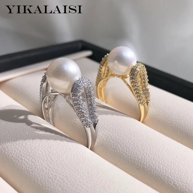 YIKALAISI 925 пробы серебряные кольца ювелирные изделия для женщин 9-10 мм круглые кольца с натуральным пресноводным жемчугом Новые оптовые продаж...
YIKALAISI 925 пробы серебряные кольца ювелирные изделия для женщин 9-10 мм круглые кольца с натуральным пресноводным жемчугом Новые оптовые продаж...