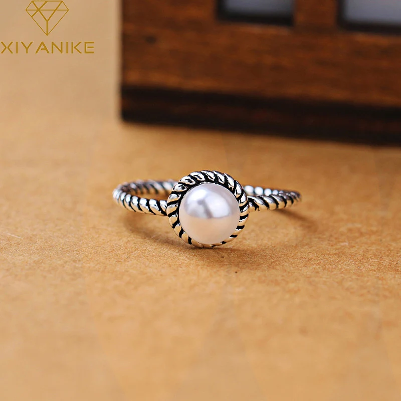 XIYANIKE Silver Color Vintage Creative Pearl Weaving Rings Jewelry Adjustable For Women Wedding Couple Anniversary Gift
XIYANIKE Silver Color Vintage Creative Pearl Weaving Rings Jewelry Adjustable For Women Wedding Couple Anniversary Gift