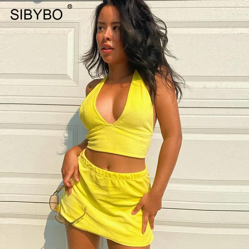 Sibybo Summer V-Neck Top Skirt Sets Summer Outfit Women Sexy Backless Mini Beach Skirts Femme 2 Piece Set Bodycon Dress 2021
Sibybo Summer V-Neck Top Skirt Sets Summer Outfit Women Sexy Backless Mini Beach Skirts Femme 2 Piece Set Bodycon Dress 2021