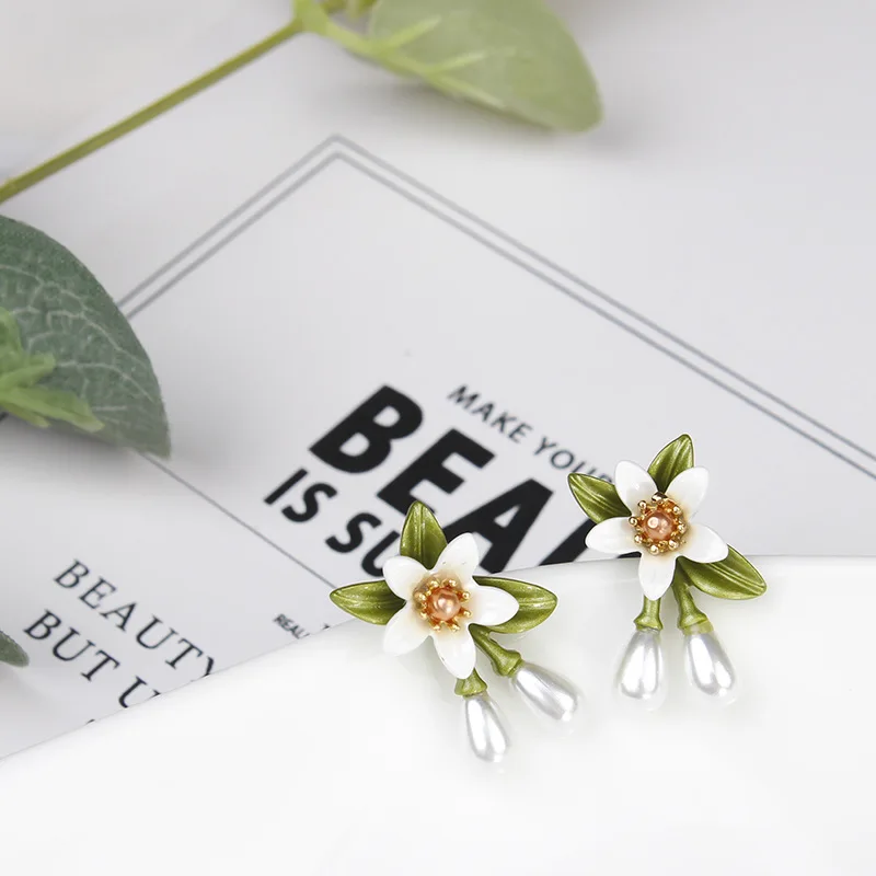 Luxury Female Enamel Flower Small Earrings Trendy Gold Color Stud Earrings For Women Charm White Pearl Wedding Earrings
Luxury Female Enamel Flower Small Earrings Trendy Gold Color Stud Earrings For Women Charm White Pearl Wedding Earrings