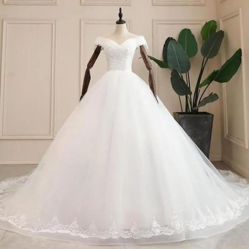Vestido De Noiva White Wedding Dresses Hot Wedding Gown Elegant Boat Neck Ball Gown Robe De Mariee Customize Real Photo
Vestido De Noiva White Wedding Dresses Hot Wedding Gown Elegant Boat Neck Ball Gown Robe De Mariee Customize Real Photo