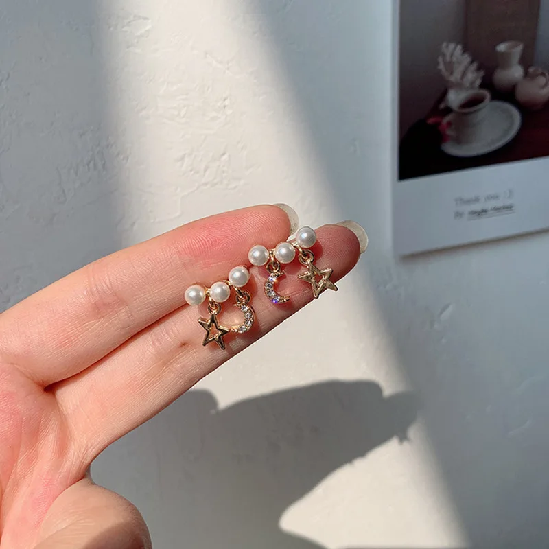 Star And Moon Earrings New Fashion Small And Simple Design Cool Wind Pearl Earrings Sweet And Lovely Earrings For Women
Star And Moon Earrings New Fashion Small And Simple Design Cool Wind Pearl Earrings Sweet And Lovely Earrings For Women