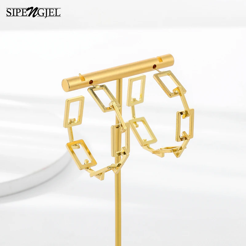 Trendy Gold large circle round stud Earrings Personality ellipse and line link geometric Earrings For Women Korean Jewelry
Trendy Gold large circle round stud Earrings Personality ellipse and line link geometric Earrings For Women Korean Jewelry
