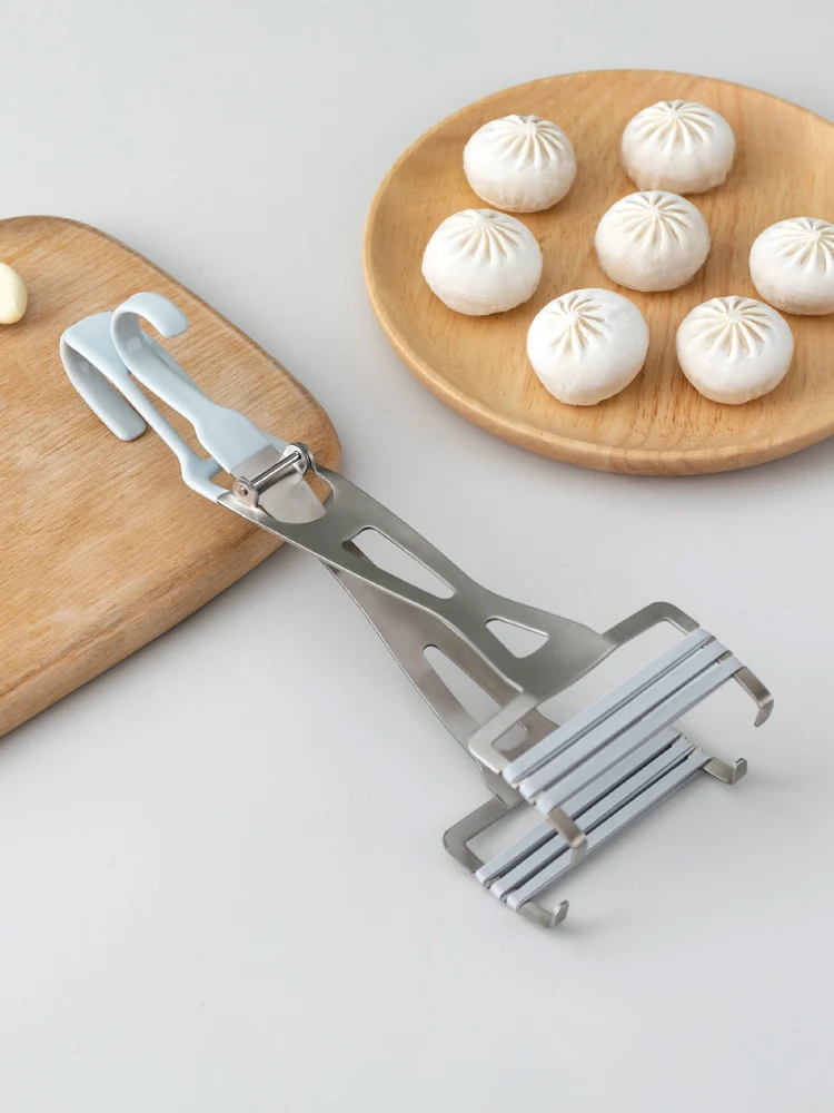 Take the multi-purpose kitchen bowl bowl clamp plate clip clip clip against hot domestic steamer steamed dishes mentioned disc
Take the multi-purpose kitchen bowl bowl clamp plate clip clip clip against hot domestic steamer steamed dishes mentioned disc