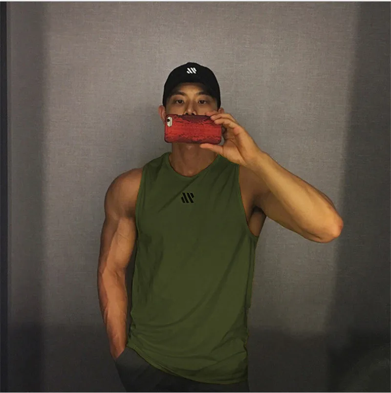2021 Mens Fitness Gym Running Tank Tops Male Sleeveless Workout Shirt Summer Breathable Sports Vest Undershirt Casual Clothing
2021 Mens Fitness Gym Running Tank Tops Male Sleeveless Workout Shirt Summer Breathable Sports Vest Undershirt Casual Clothing