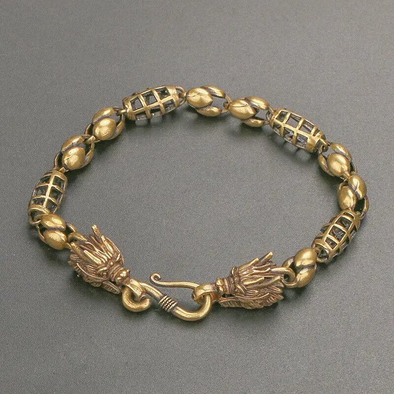 China Old Tibet Antique Brass Copper Carved Dragon Head Bracelet with Wristband Hollow Out Mascot Gift
China Old Tibet Antique Brass Copper Carved Dragon Head Bracelet with Wristband Hollow Out Mascot Gift