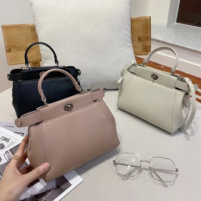 Leather Handbag Small 20cm Lady Cat Bag Crossbody With Compartments, First Layer Cowhide, Fashionable And Versatile High-Quality
Leather Handbag Small 20cm Lady Cat Bag Crossbody With Compartments, First Layer Cowhide, Fashionable And Versatile High-Quality