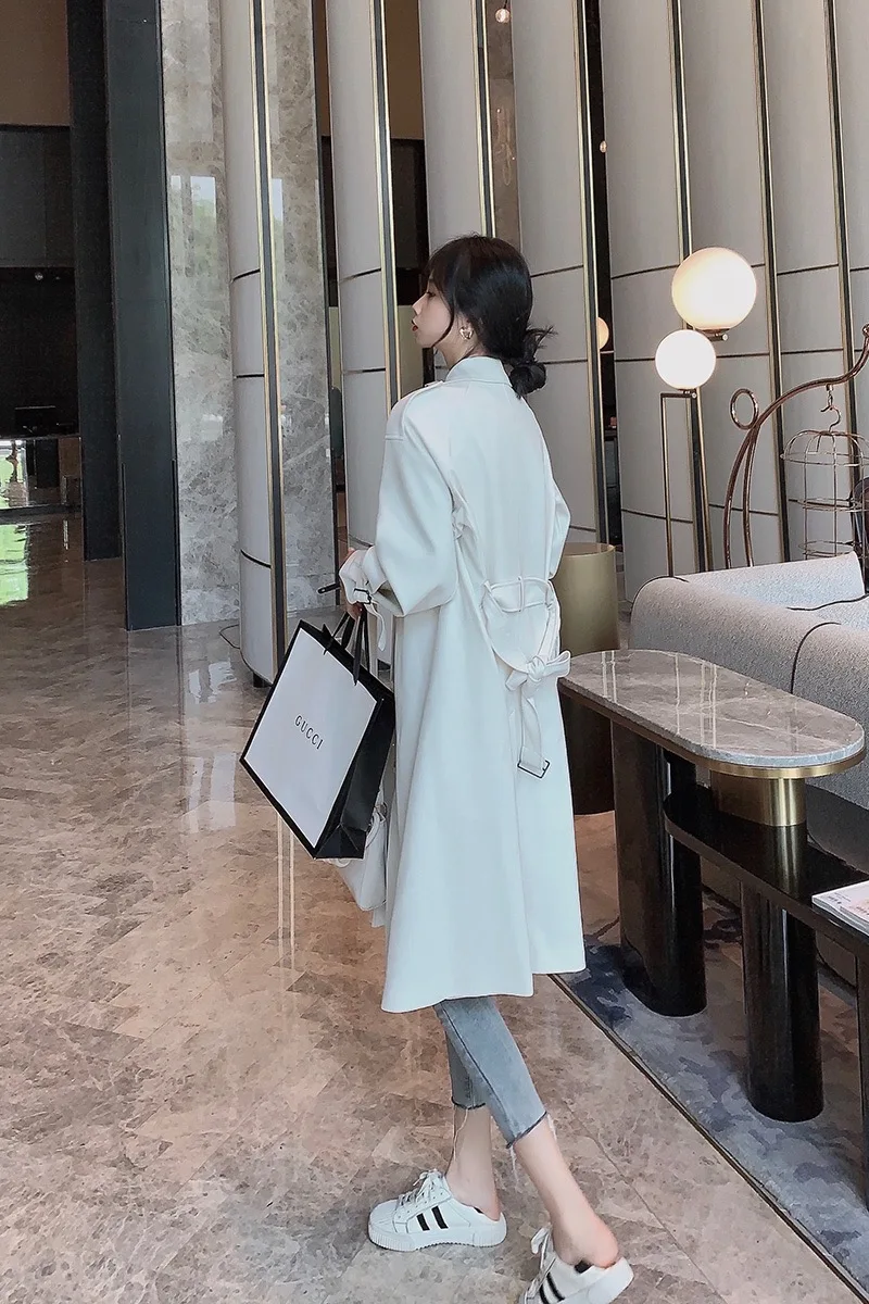 Women's White Windbreaker Autumn Winter New Korean Fashion Long Knee Length Coat
Women's White Windbreaker Autumn Winter New Korean Fashion Long Knee Length Coat