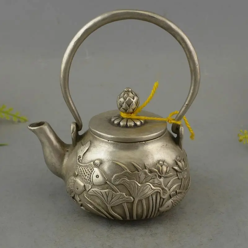 Collectible Decor Old Handwork Silver Plate Copper Carving Lotus Fish Tea Pot
Collectible Decor Old Handwork Silver Plate Copper Carving Lotus Fish Tea Pot