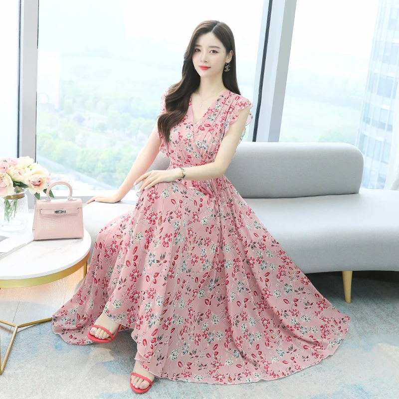 2021 New Summer Women Beach Vacation Sexy V-Neck Ruffles Sleeve Slim Long Dress Sweet Floral Chiffon Dress 
2021 New Summer Women Beach Vacation Sexy V-Neck Ruffles Sleeve Slim Long Dress Sweet Floral Chiffon Dress