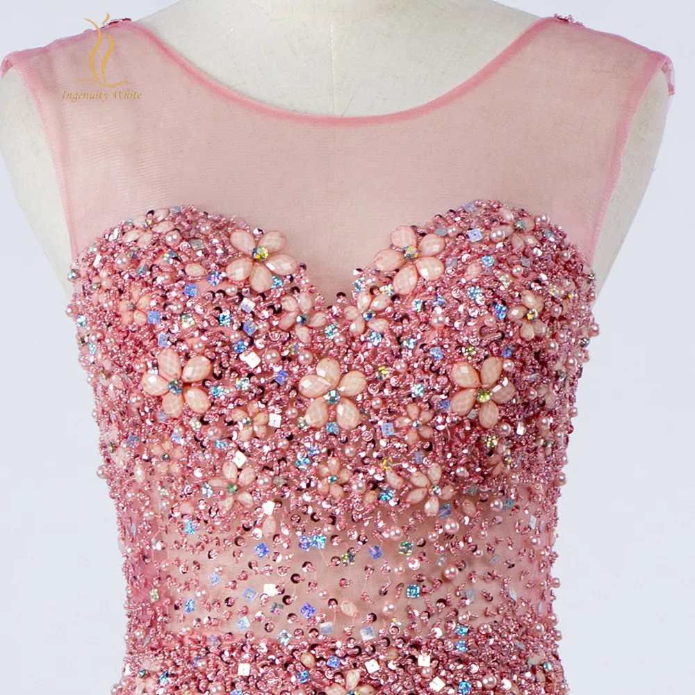 Sexy Prom Dresses Mermaid Long Sheer Neck Backless Beaded Feather Luxurious Party Evening Gowns Sequins Crystals Dubai Robe de
Sexy Prom Dresses Mermaid Long Sheer Neck Backless Beaded Feather Luxurious Party Evening Gowns Sequins Crystals Dubai Robe de