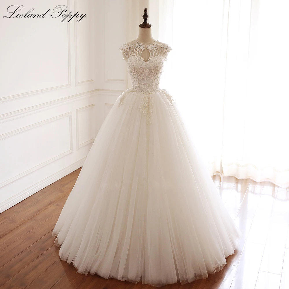 Lceland Poppy A-line Beaded Wedding Dresses Lace Appliques Sleeveless O Neck Floor Length Vestido de Novia Lace Bridal Gowns
Lceland Poppy A-line Beaded Wedding Dresses Lace Appliques Sleeveless O Neck Floor Length Vestido de Novia Lace Bridal Gowns