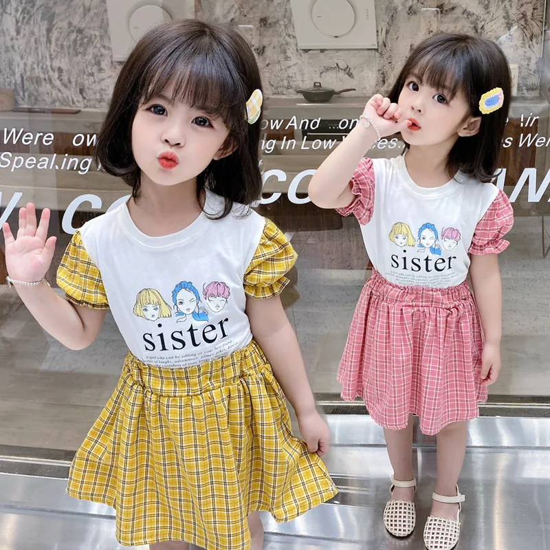 Plaid skirt printing short sleeve T-shirt children suit of the girls
Plaid skirt printing short sleeve T-shirt children suit of the girls