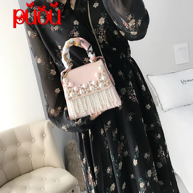 In the autumn of 2021 the new tide handbag Pearl studded beaded tassel shoulder portable messenger bag pearl crossbody bag
In the autumn of 2021 the new tide handbag Pearl studded beaded tassel shoulder portable messenger bag pearl crossbody bag