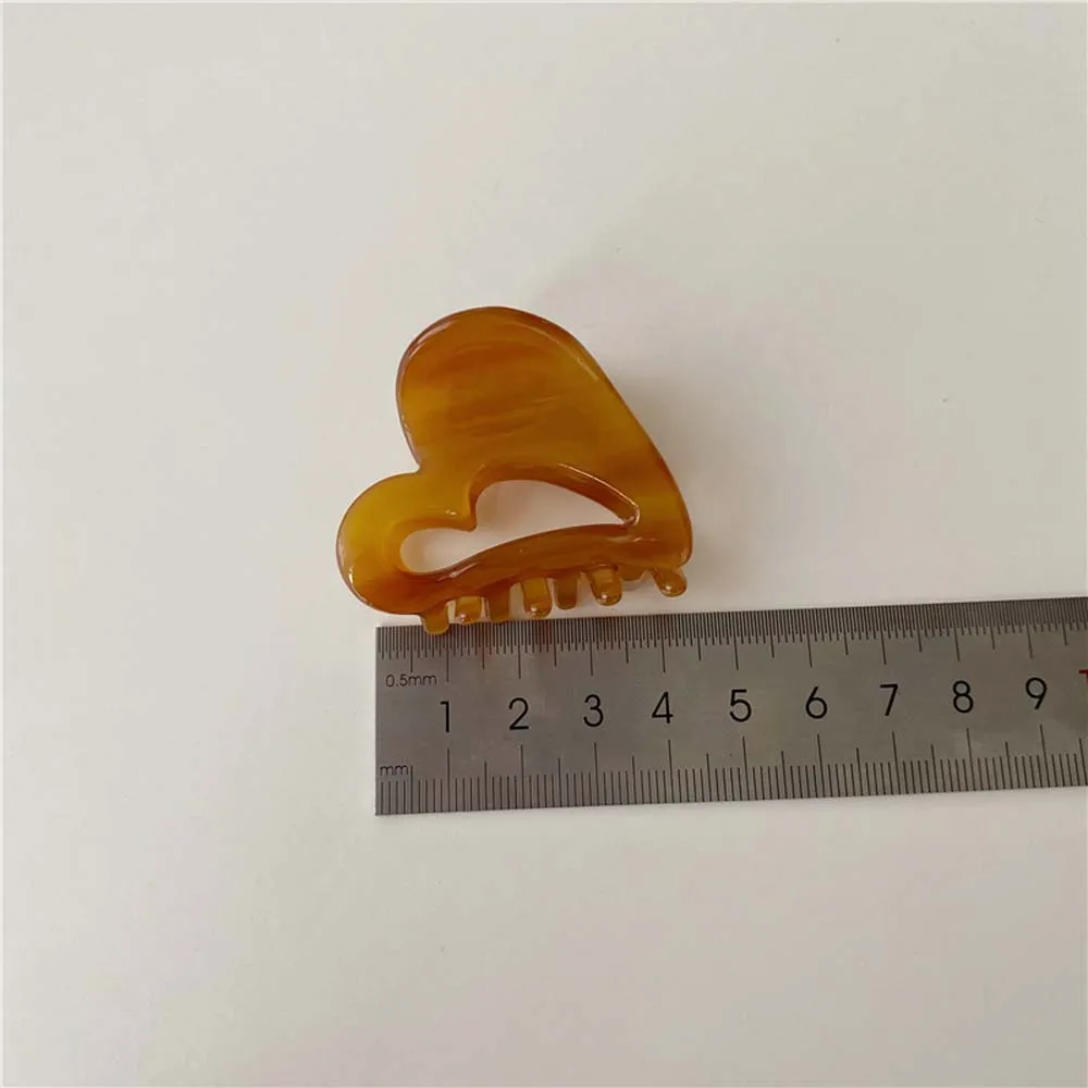 Fashion Lovely Heart Hair Claw Small Hollow Out Elegant Colorful Sweet Hair Crab Clip for Women Girls Hair Accessories
Fashion Lovely Heart Hair Claw Small Hollow Out Elegant Colorful Sweet Hair Crab Clip for Women Girls Hair Accessories