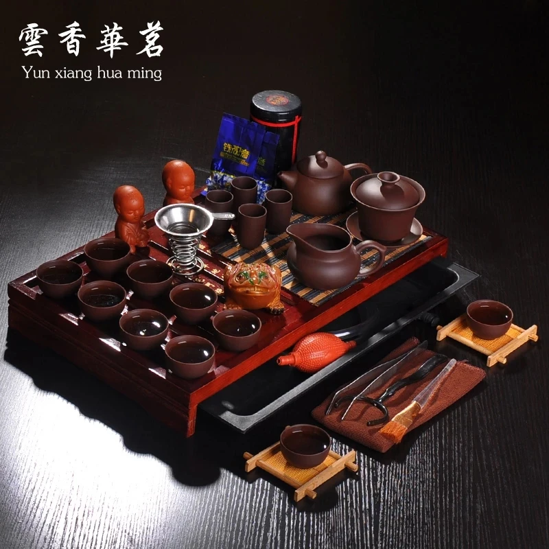 Yixing tea set purple ceramic teapot wedding set of tea cups solid wood tea tray tea ceremony on sale
Yixing tea set purple ceramic teapot wedding set of tea cups solid wood tea tray tea ceremony on sale