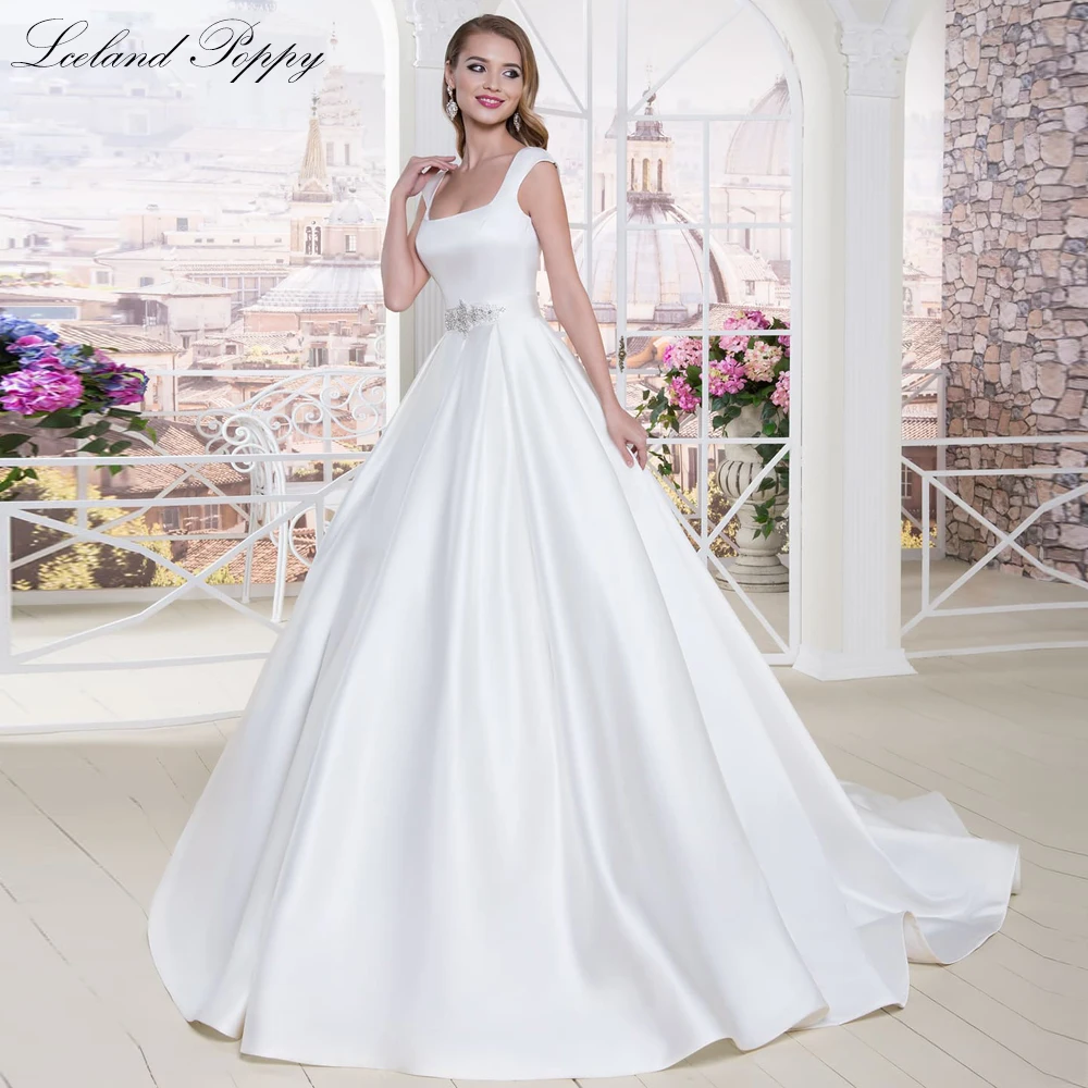Lceland Poppy A Line Square Neck Satin Wedding Dresses Sleeveless Beaded Bridal Gowns Vestido de Noiva with Court Train
Lceland Poppy A Line Square Neck Satin Wedding Dresses Sleeveless Beaded Bridal Gowns Vestido de Noiva with Court Train